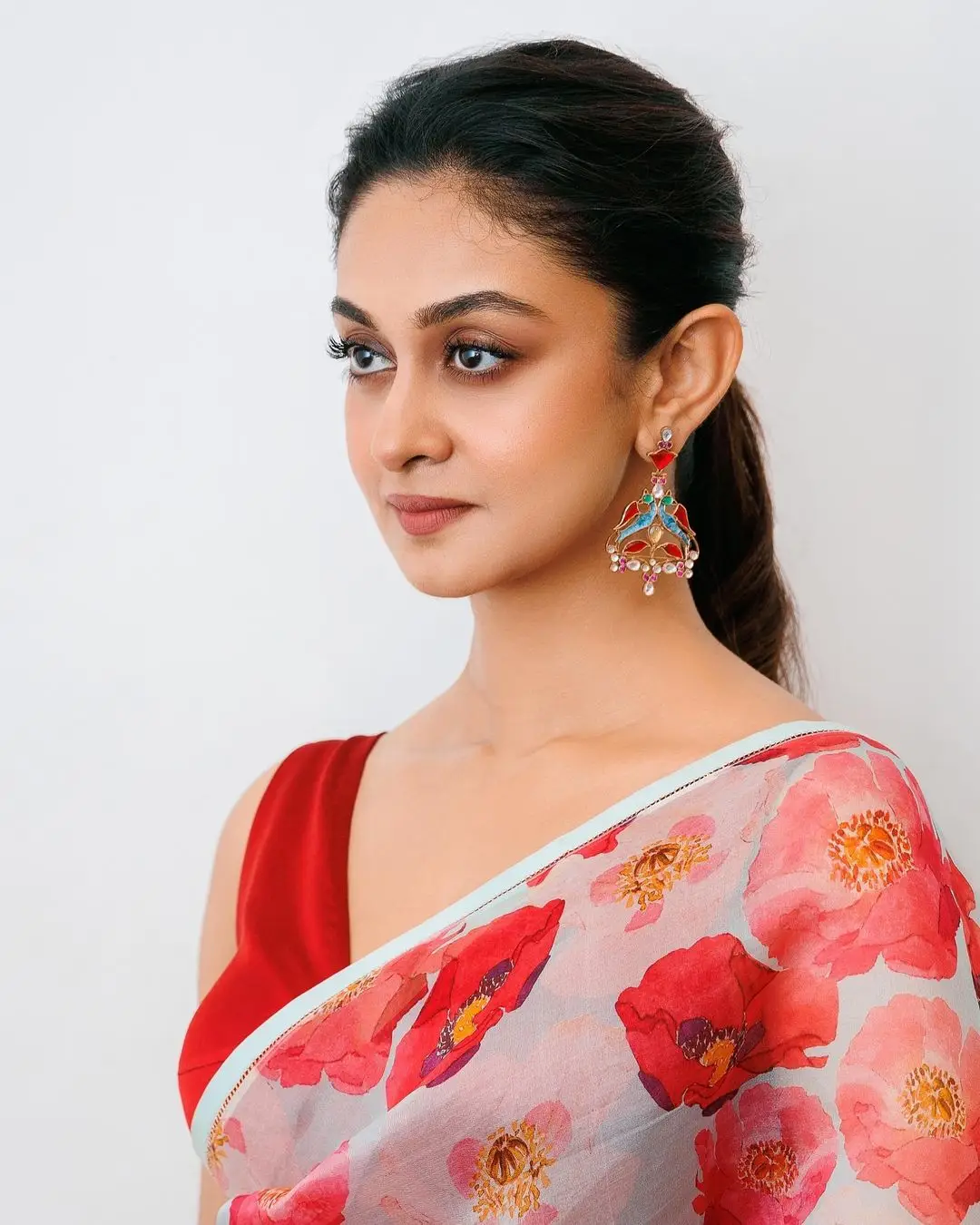 Tamil Girl Aishwarya Arjun Wearing Red Saree Sleeveless Blouse